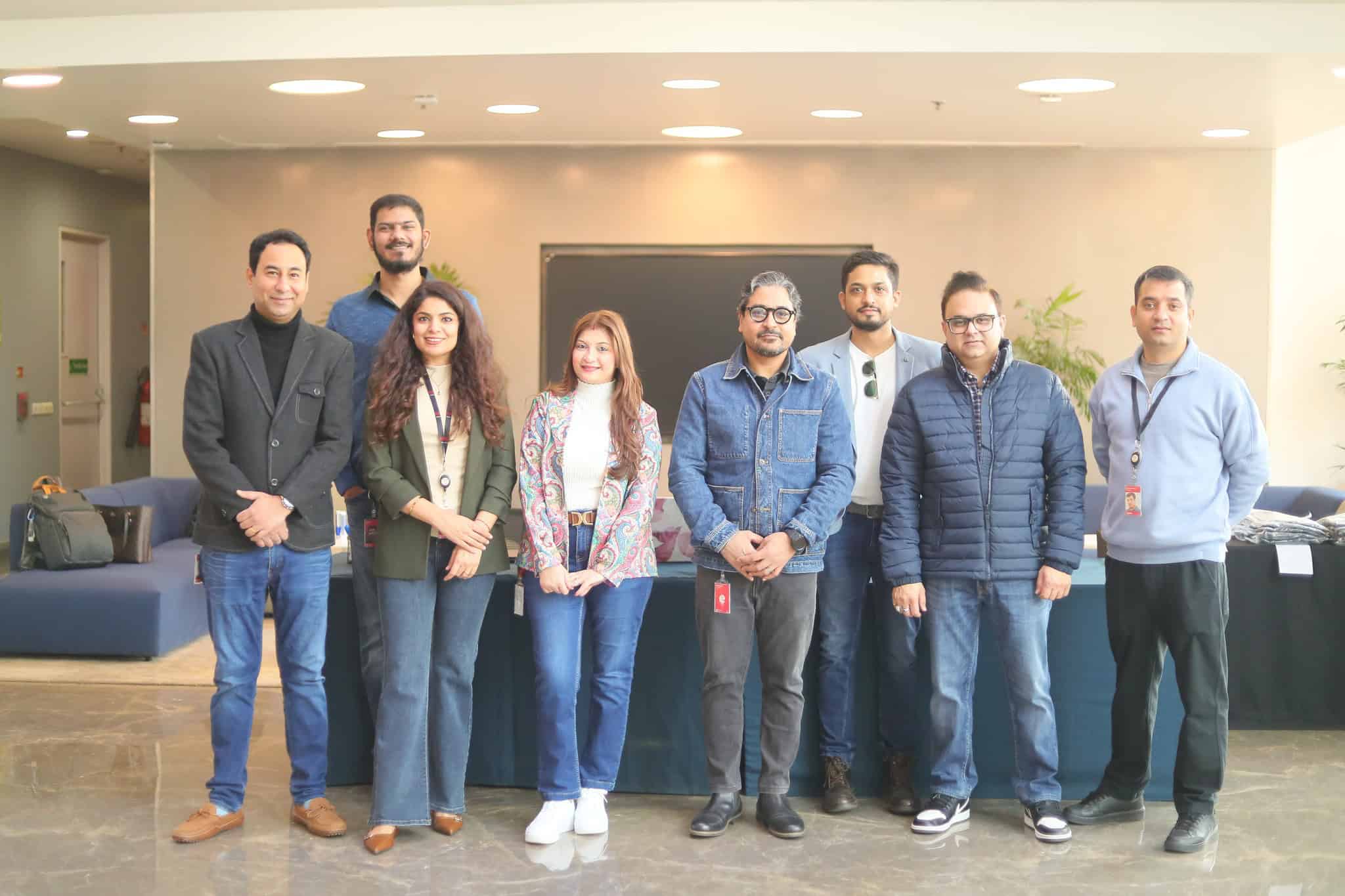 Group Of Professionals Standing Together At Coldfusion Summit India.