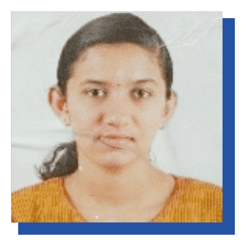 Adobe Coldfusion Summit India - A Summary Of All Previous Summits 32 Close-Up Of Young Woman With Dark Hair And Casual Orange Sweater.