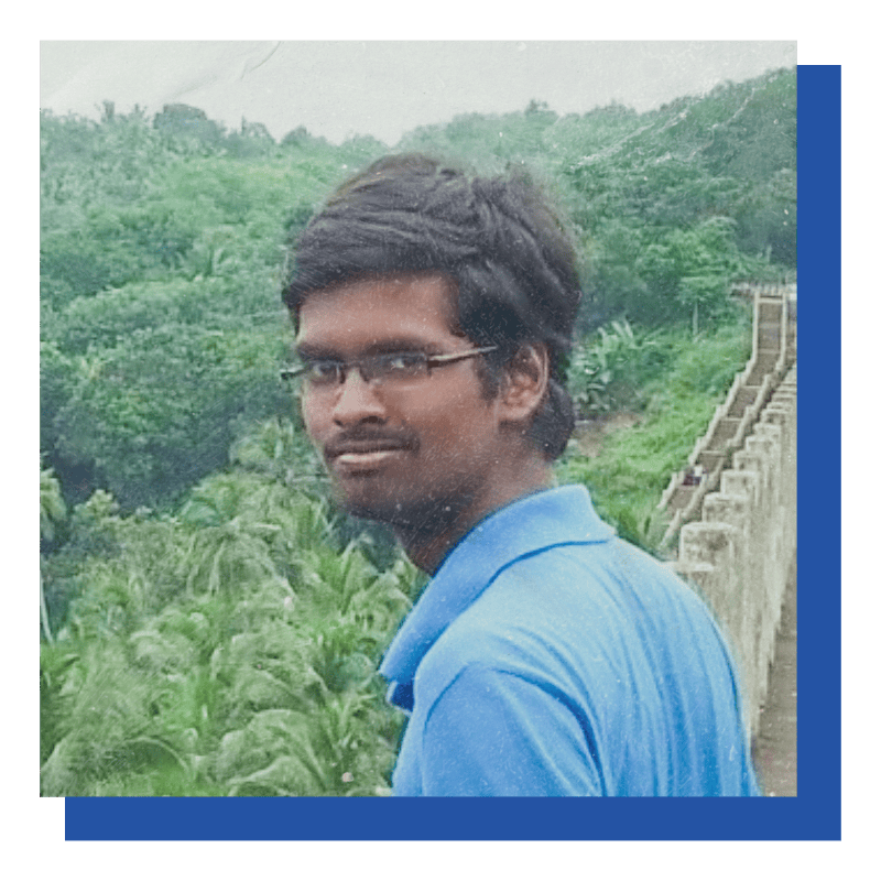 Adobe Coldfusion Summit India - A Summary Of All Previous Summits 21 Young Man In Blue Shirt With Glasses Outdoors.